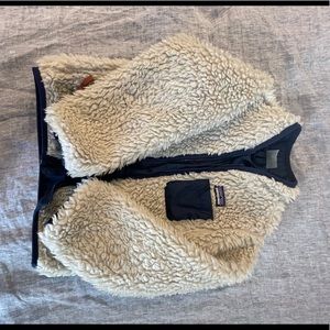 Kids Patagonia fleece.  Natural fleece, navy nylon interior. Great condition